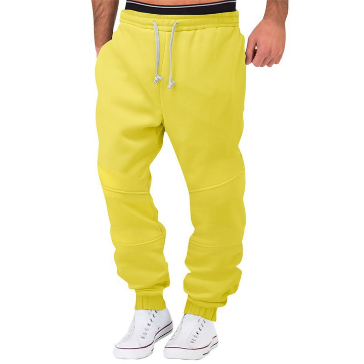 Herrens avslappnade joggingsbyxor med elastisk midja och sidofickor Mirla-Eva Jonsson