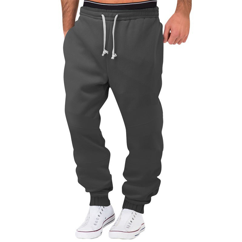 Herrens avslappnade joggingsbyxor med elastisk midja och sidofickor Mirla-Eva Jonsson