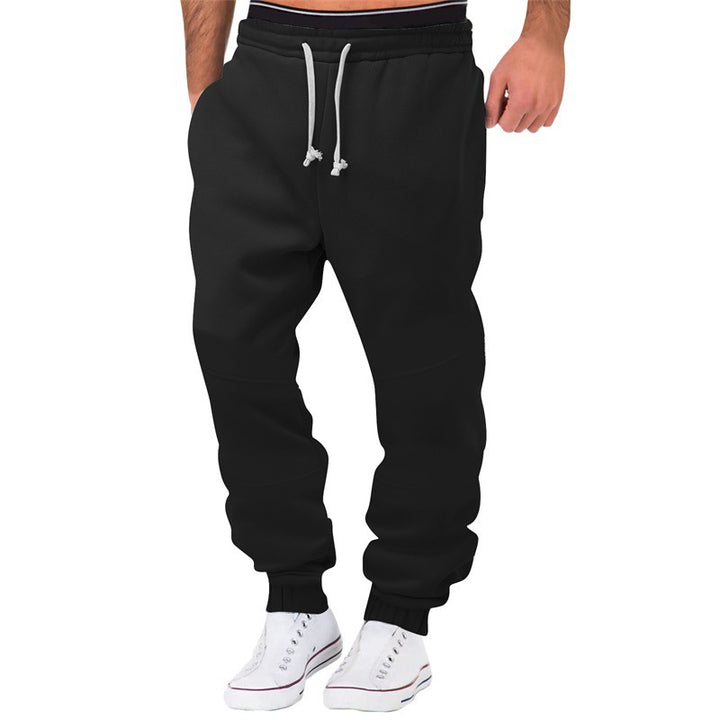 Herrens avslappnade joggingsbyxor med elastisk midja och sidofickor Mirla-Eva Jonsson