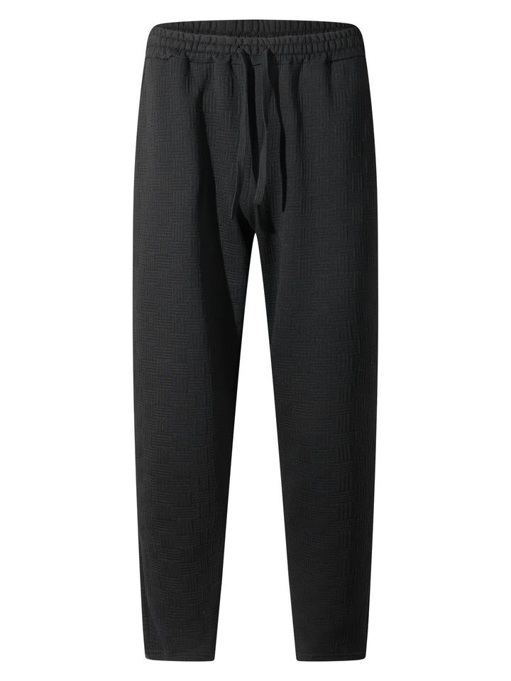 Herrens avslappnade joggingsbyxor med elastisk midja och strukturerad design Mirla-Eva Jonsson
