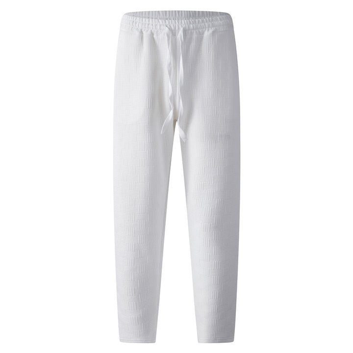 Herrens avslappnade joggingsbyxor med elastisk midja och strukturerad design Mirla-Eva Jonsson