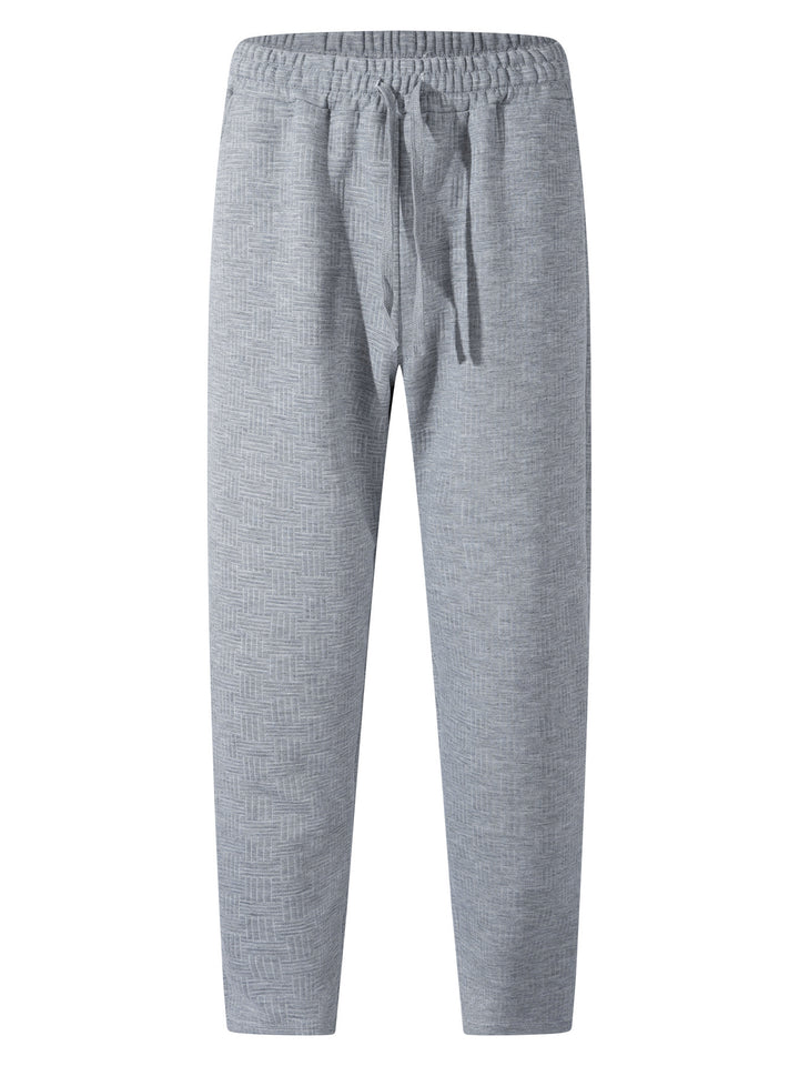 Herrens avslappnade joggingsbyxor med elastisk midja och strukturerad design Mirla-Eva Jonsson
