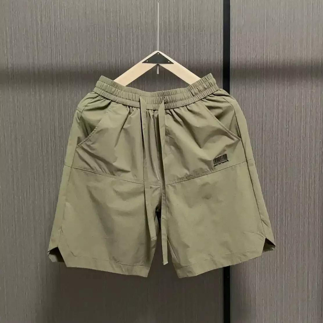 Herrens avslappnade sportshorts med elastisk midja och sidofickor Mirla-Eva Jonsson