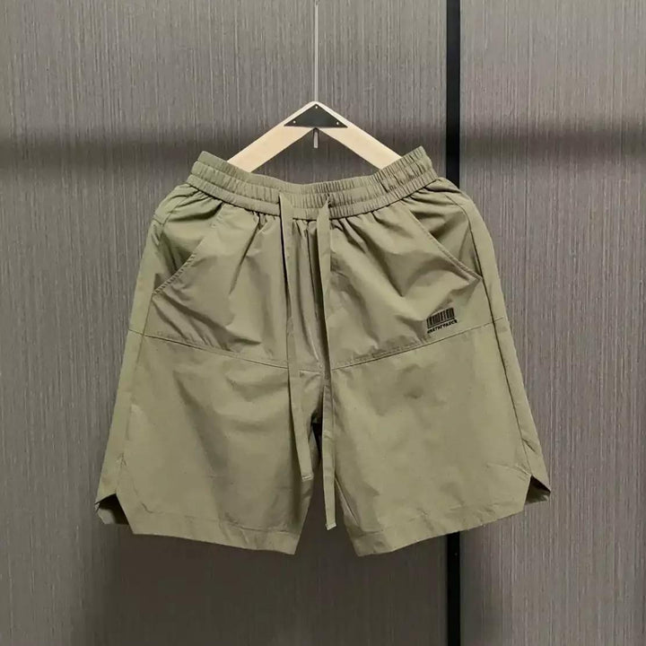 Herrens avslappnade sportshorts med elastisk midja och sidofickor Mirla-Eva Jonsson