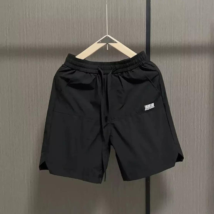 Herrens avslappnade sportshorts med elastisk midja och sidofickor Mirla-Eva Jonsson