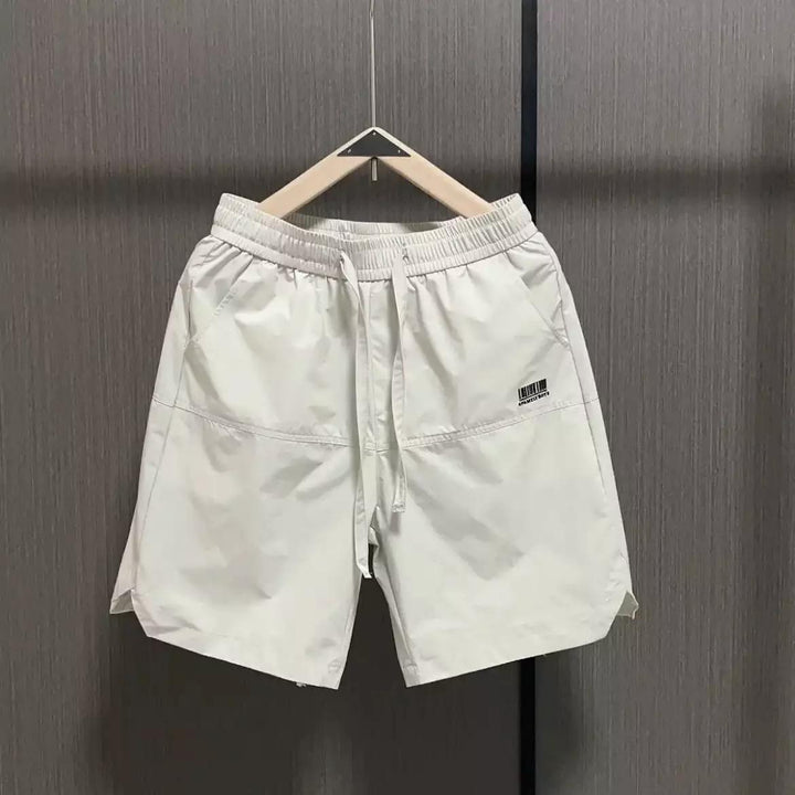 Herrens avslappnade sportshorts med elastisk midja och sidofickor Mirla-Eva Jonsson