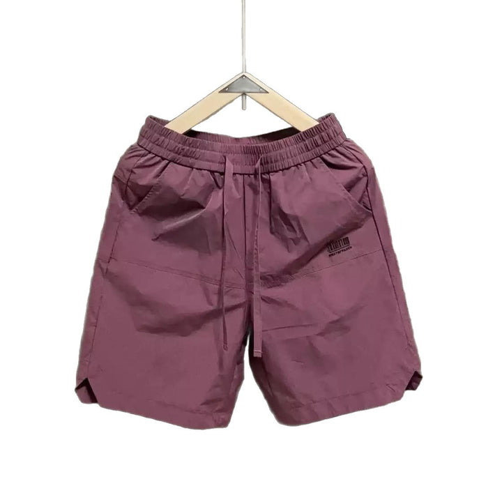 Herrens avslappnade sportshorts med elastisk midja och sidofickor Mirla-Eva Jonsson
