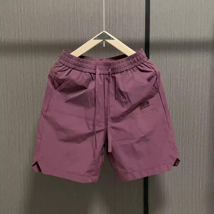 Herrens avslappnade sportshorts med elastisk midja och sidofickor Mirla-Eva Jonsson