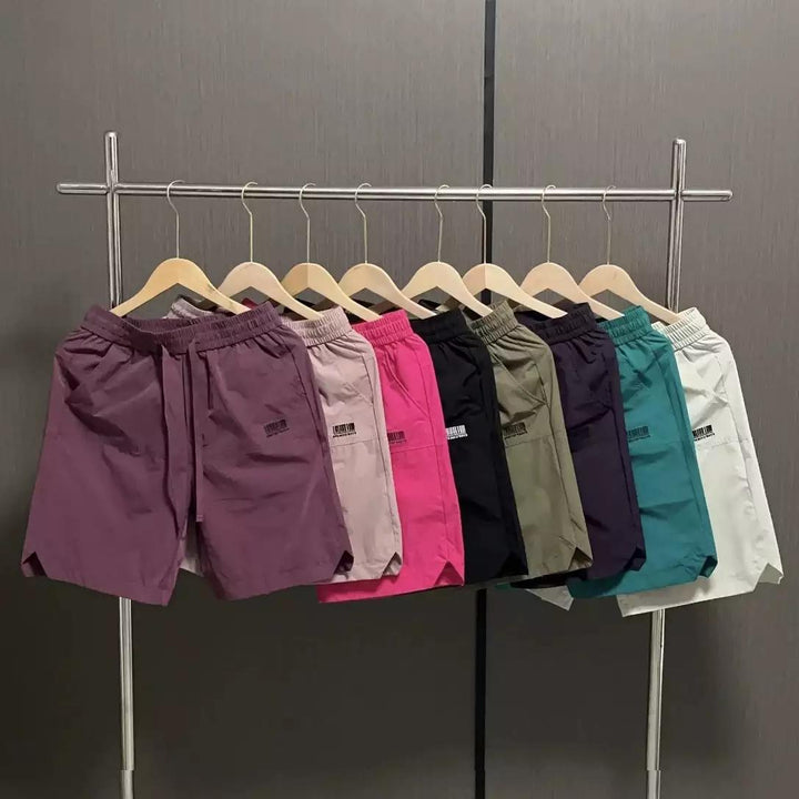 Herrens avslappnade sportshorts med elastisk midja och sidofickor Mirla-Eva Jonsson