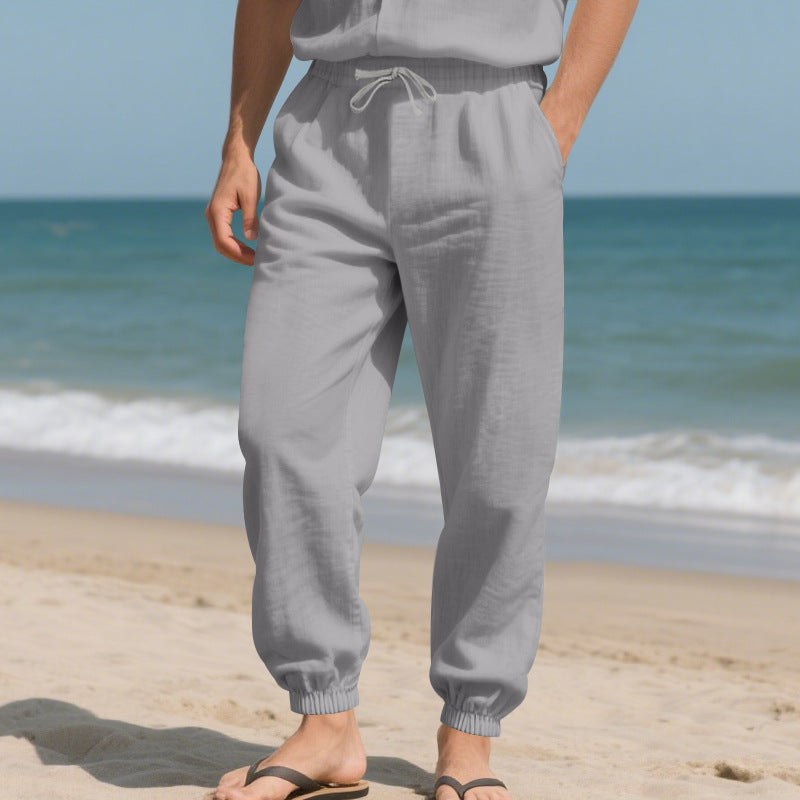Herrens avslappnade strandbyxor med elastisk midja och praktiska sidofickor Mirla-Eva Jonsson