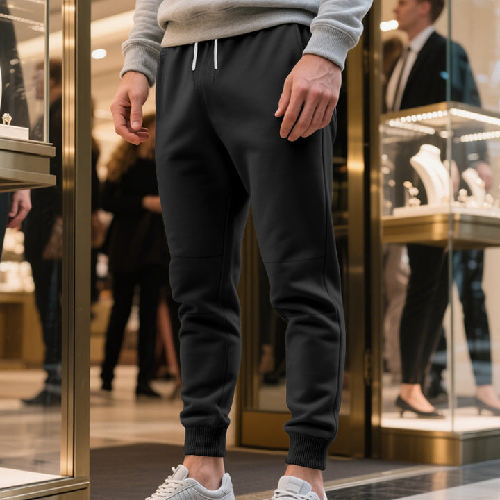 Herrens avslappnade sweatpants med elastisk midja och stängda muddar Mirla-Eva Jonsson