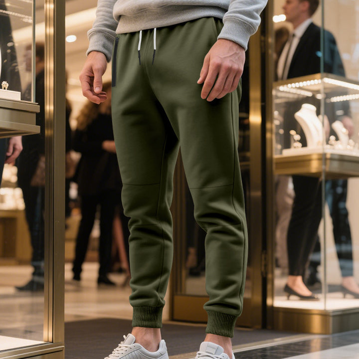Herrens avslappnade sweatpants med elastisk midja och stängda muddar Mirla-Eva Jonsson