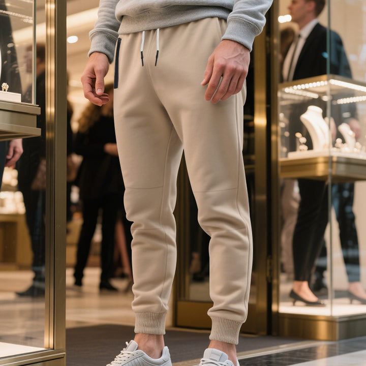 Herrens avslappnade sweatpants med elastisk midja och stängda muddar Mirla-Eva Jonsson