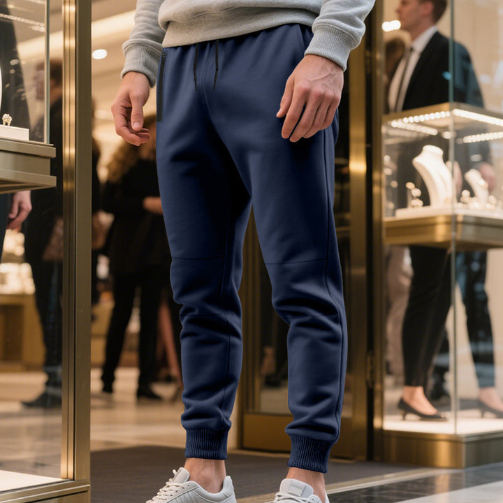 Herrens avslappnade sweatpants med elastisk midja och stängda muddar Mirla-Eva Jonsson