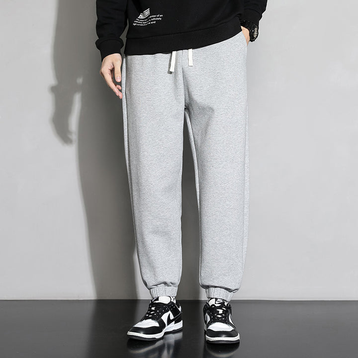 Herrens avslappnade sweatsbyxor med elastisk midja och sidofickor Mirla-Eva Jonsson