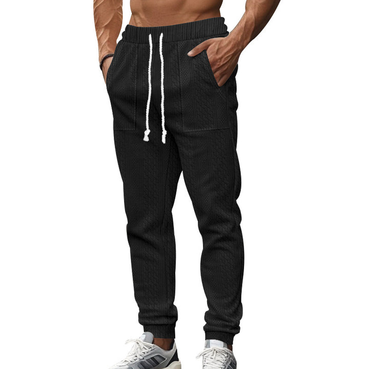 Herrens casual stickad joggingsbyxor med elastisk midja och sidofickor Mirla-Eva Jonsson