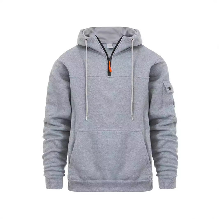 Herrens hoodie med praktiska fickor från Mirla-Eva Jonsson