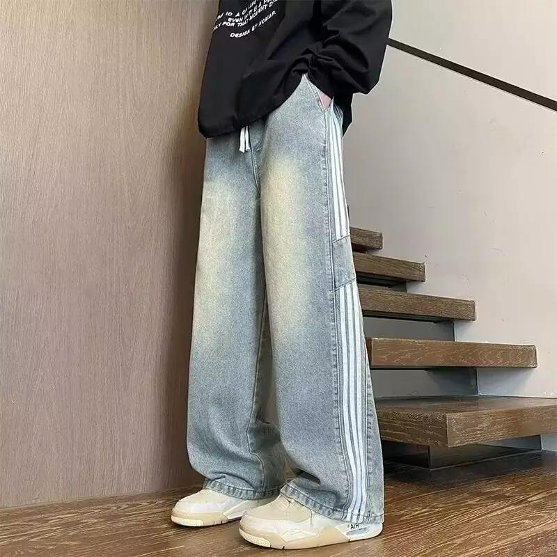 Herrens lockiga denimbyxor med sidostråk och fickor Mirla-Eva Jonsson