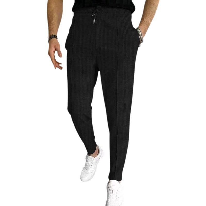 Herrens modiska joggingbyxor med elastisk midja och praktiska fickor Mirla-Eva Jonsson
