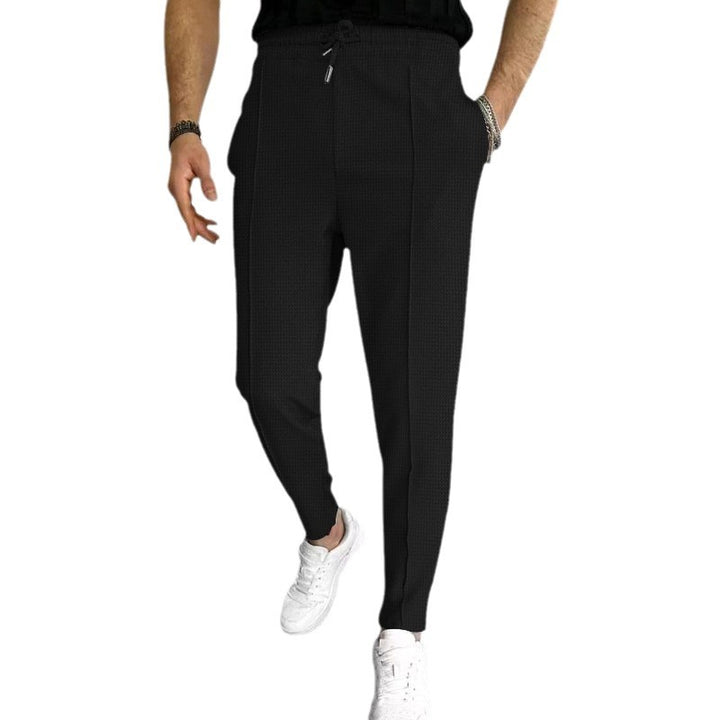 Herrens modiska joggingbyxor med elastisk midja och praktiska fickor Mirla-Eva Jonsson