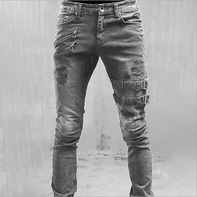 Herrjeans med stilfull dragkedja och slitna detaljer Mirla-Eva Jonsson
