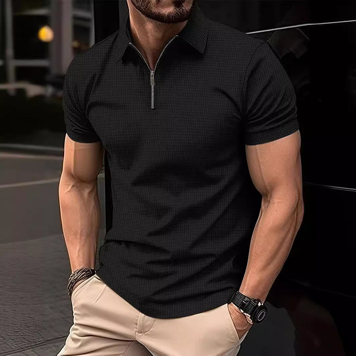 Herrkortärmad poloshirt med dragkedja och strukturerad design Mirla-Eva Jonsson