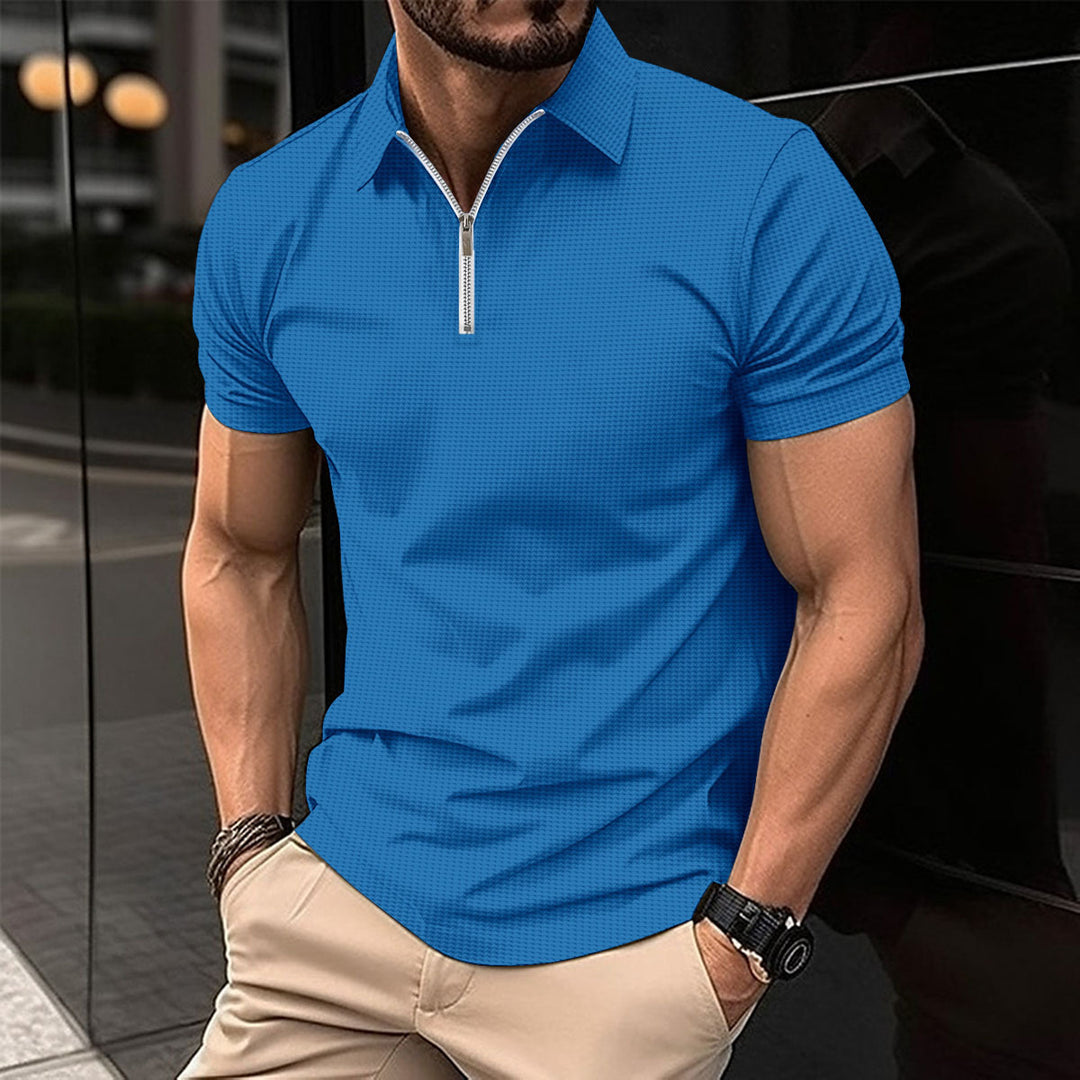 Herrkortärmad poloshirt med dragkedja och strukturerad design Mirla-Eva Jonsson