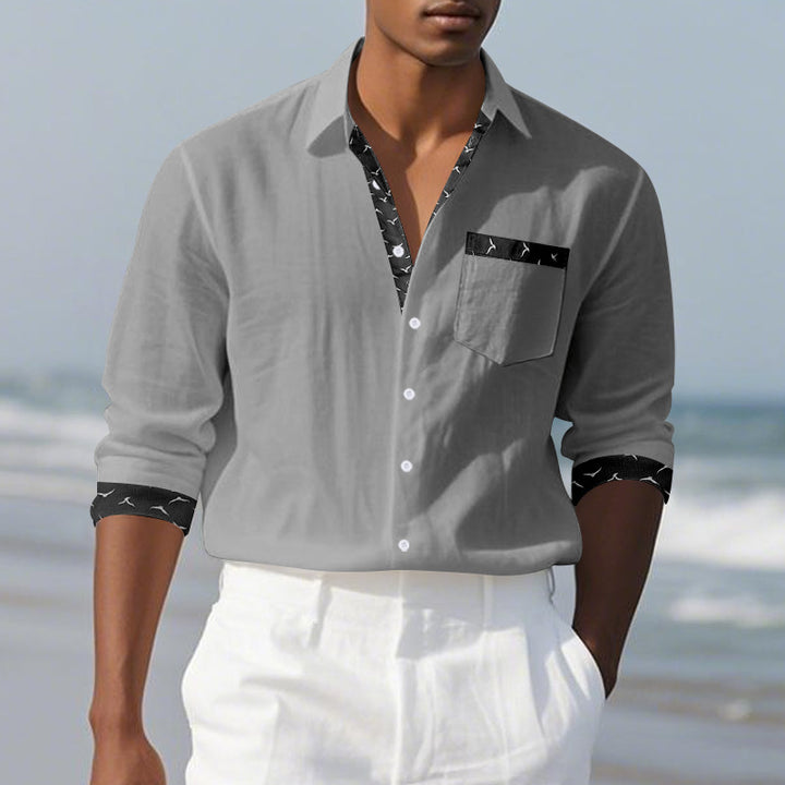 Herrmode långärmad skjorta med stiligt mönster och praktisk bröstficka Mirla-Eva Jonsson