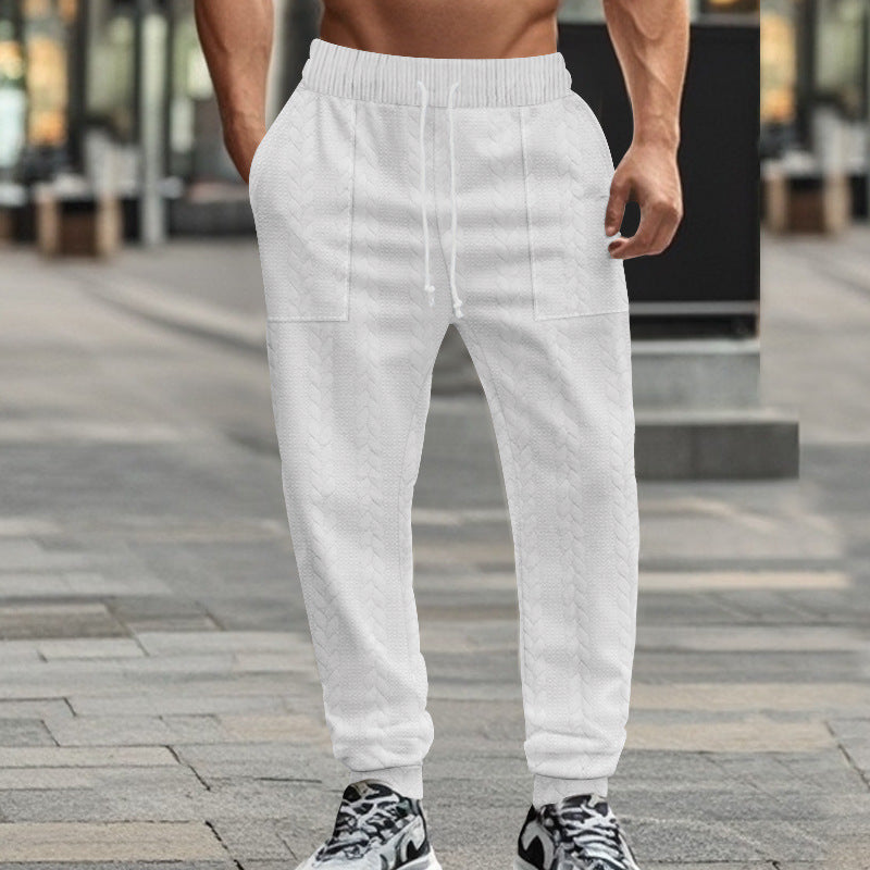 Herrmoderna sweatpants med strukturerad design och praktiska fickor Eva Jonsson-Eva Jonsson