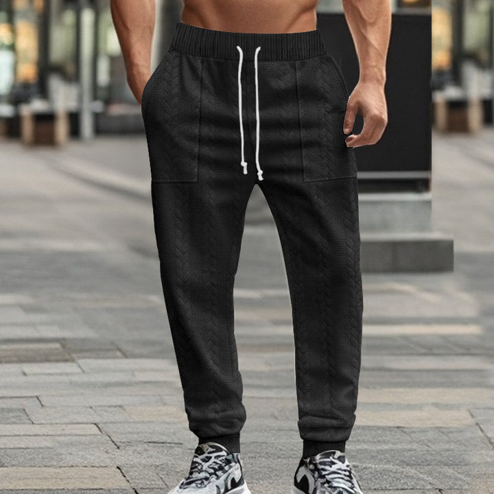 Herrmoderna sweatpants med strukturerad design och praktiska fickor Eva Jonsson-Eva Jonsson