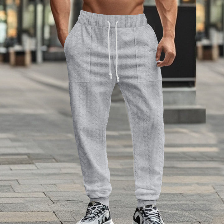 Herrmoderna sweatpants med strukturerad design och praktiska fickor Eva Jonsson-Eva Jonsson