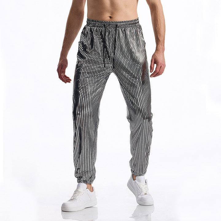 Herrns andningsbara joggingsbyxor med modern prickdesign Mirla-Eva Jonsson