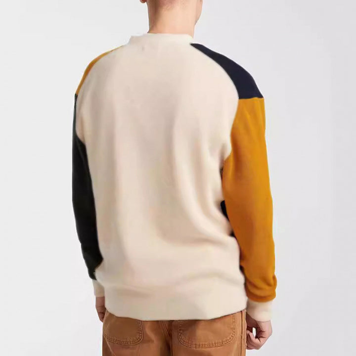 Herrstickad cardigan med moderna färgblocksdetaljer och praktiska fickor Mirla-Eva Jonsson