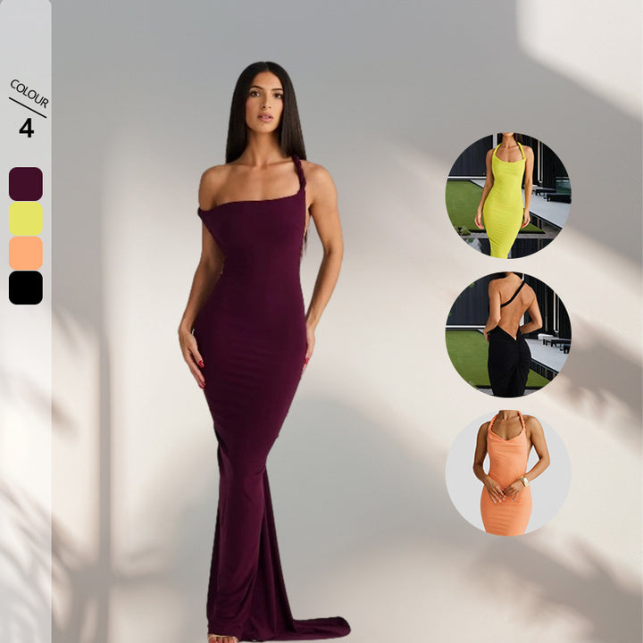 Kvinna figurnära kvällsklänning med elegant halterdesign och svängande fåll Mirla-Eva Jonsson