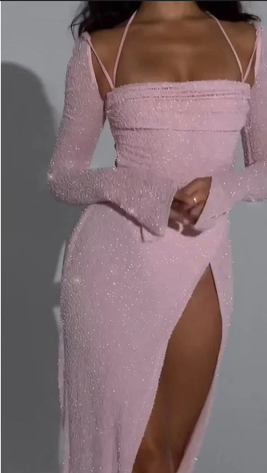 Kvinna kvällsklänning med glittrande material och elegant slits-Eva Jonsson