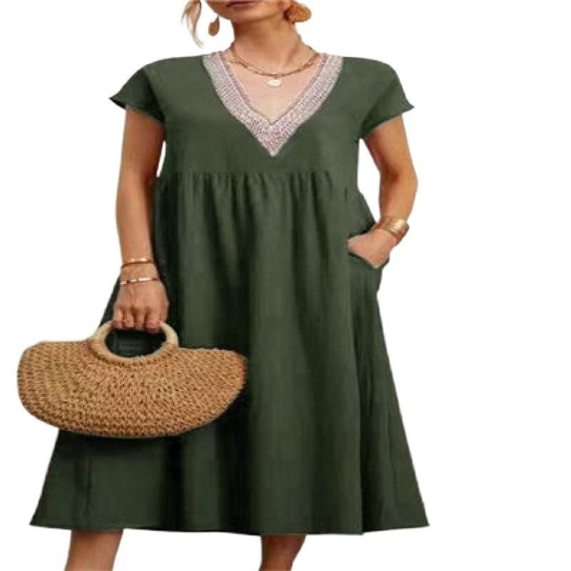 Kvinna maxi dress med elegant V-hals och sidofickor Mirla-Eva Jonsson