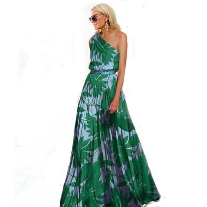Kvinna maxi klänning med asymmetrisk topp och blommönster-Eva Jonsson