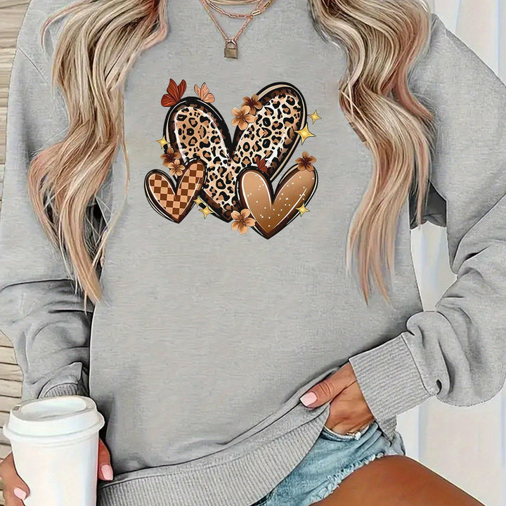 Kvinna sweatshirt med attraktiva hjärtmotiv Mirla-Eva Jonsson