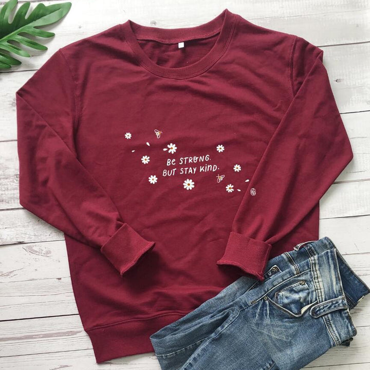 Kvinna sweatshirt med inspirerande budskap och blommig design Mirla-Eva Jonsson