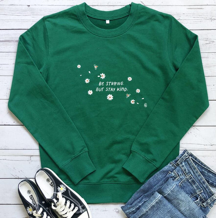 Kvinna sweatshirt med inspirerande budskap och blommig design Mirla-Eva Jonsson