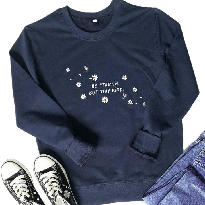 Kvinna sweatshirt med inspirerande budskap och blommig design Mirla-Eva Jonsson