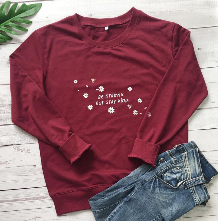 Kvinna sweatshirt med inspirerande budskap och blommig design Mirla-Eva Jonsson