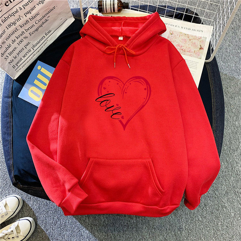 Kvinnas hoodie med kreativ hjärttryck och mjukt innerfoder Mirla-Eva Jonsson