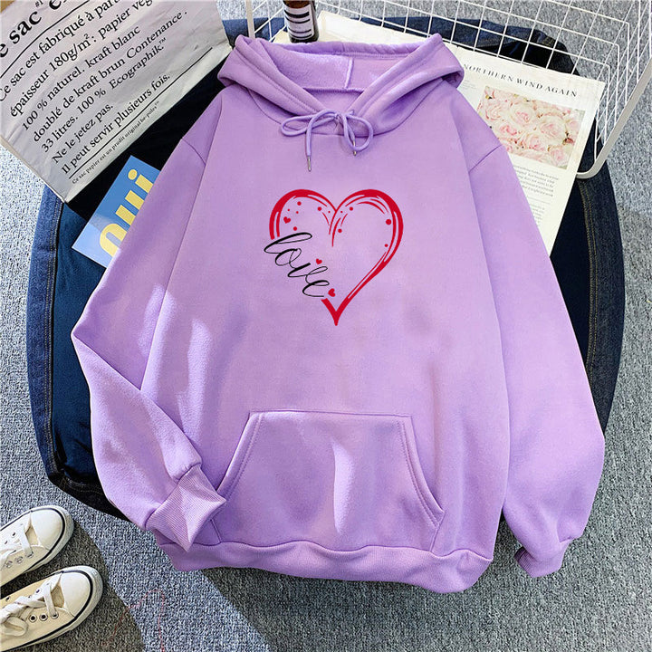 Kvinnas hoodie med kreativ hjärttryck och mjukt innerfoder Mirla-Eva Jonsson