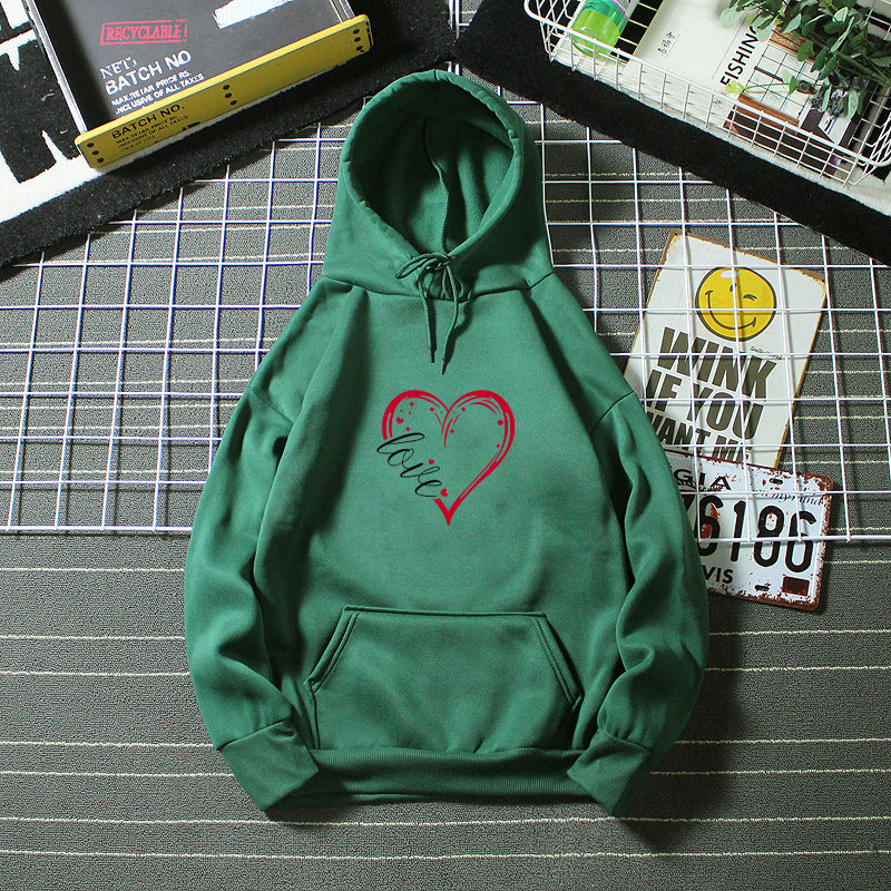 Kvinnas hoodie med kreativ hjärttryck och mjukt innerfoder Mirla-Eva Jonsson