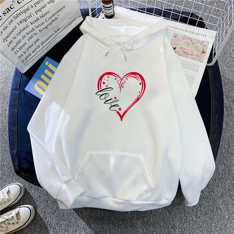 Kvinnas hoodie med kreativ hjärttryck och mjukt innerfoder Mirla-Eva Jonsson