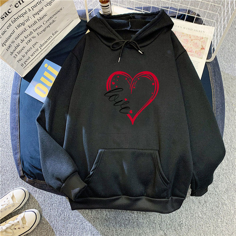 Kvinnas hoodie med kreativ hjärttryck och mjukt innerfoder Mirla-Eva Jonsson