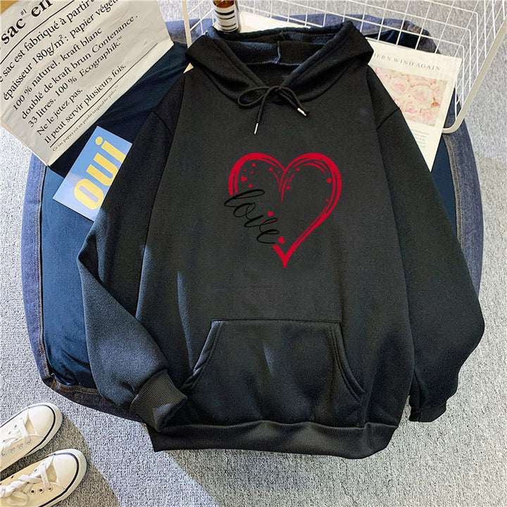 Kvinnas hoodie med kreativ hjärttryck och mjukt innerfoder Mirla-Eva Jonsson