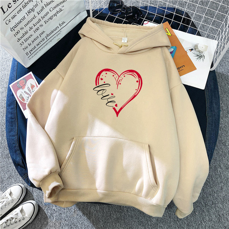 Kvinnas hoodie med kreativ hjärttryck och mjukt innerfoder Mirla-Eva Jonsson