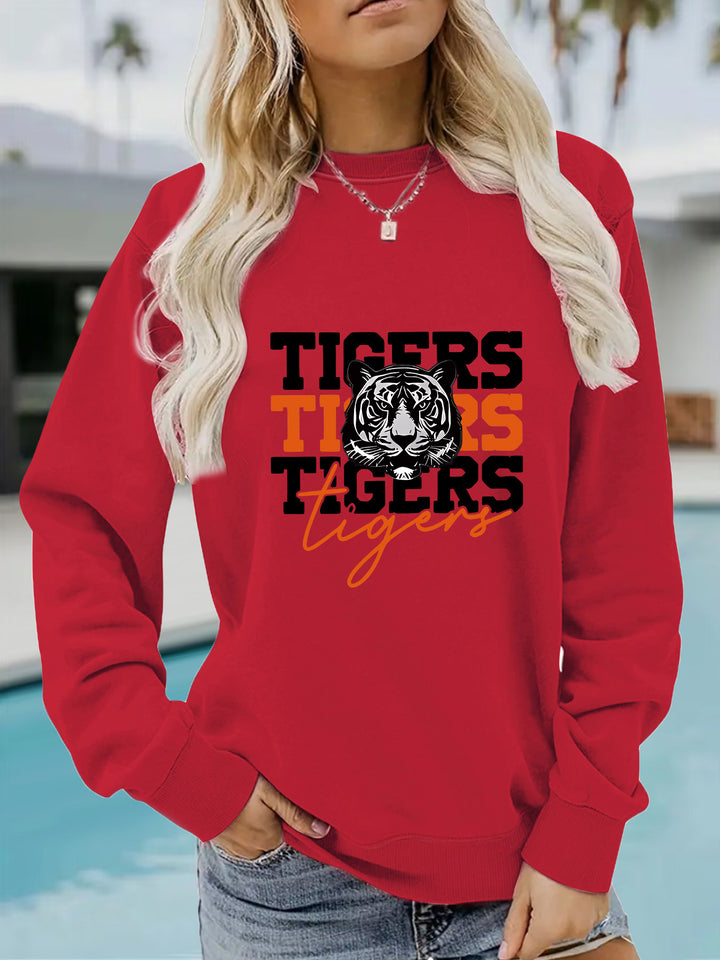Kvinnas sweatshirt med djurisk tigerdesign och avslappnad passform Mirla-Eva Jonsson
